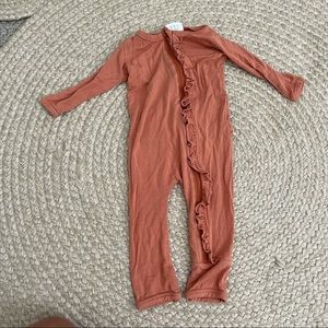 Terra cotta zip onesie with ruffle booty